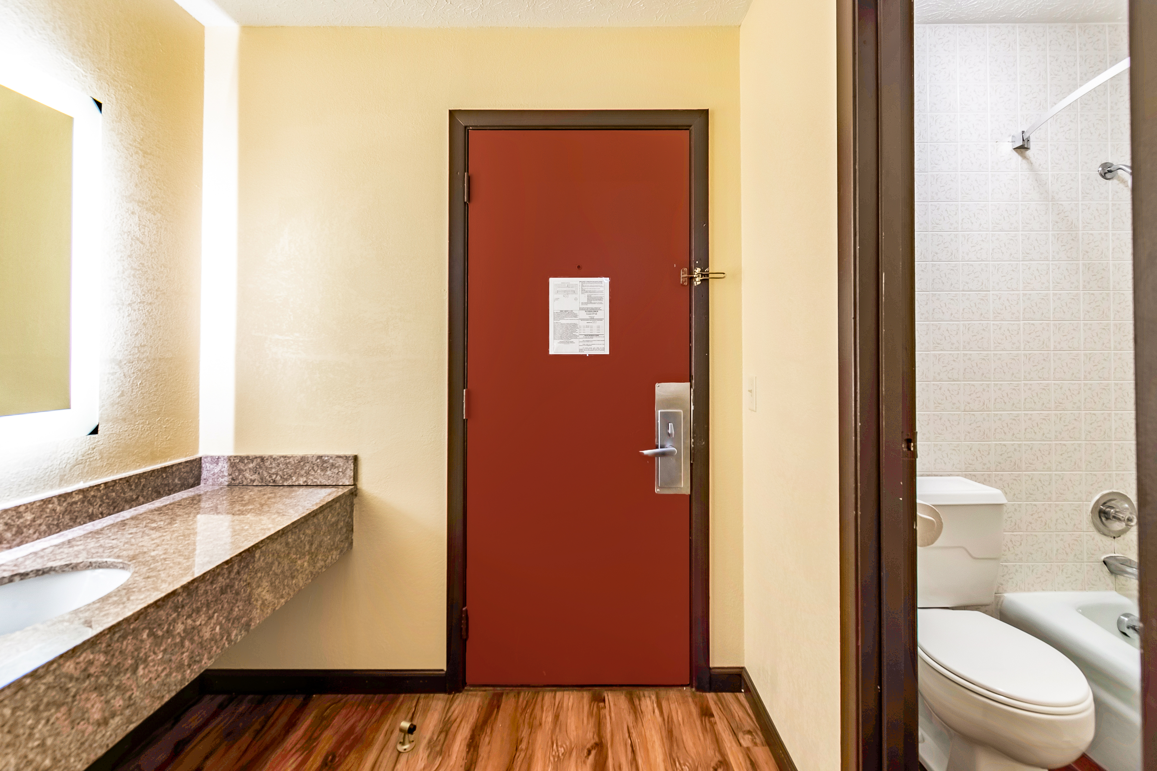 Queen bedroom entry and bathroom